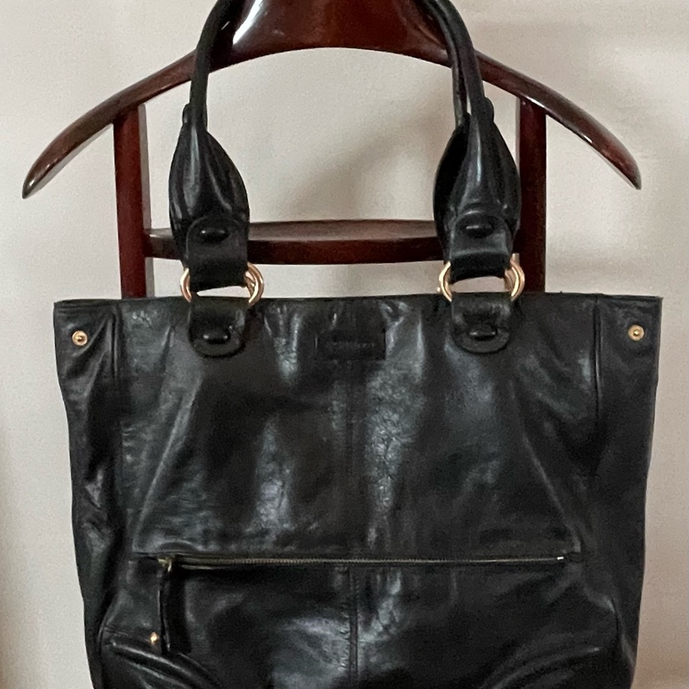 BCBG soft leather large beautiful black purse .